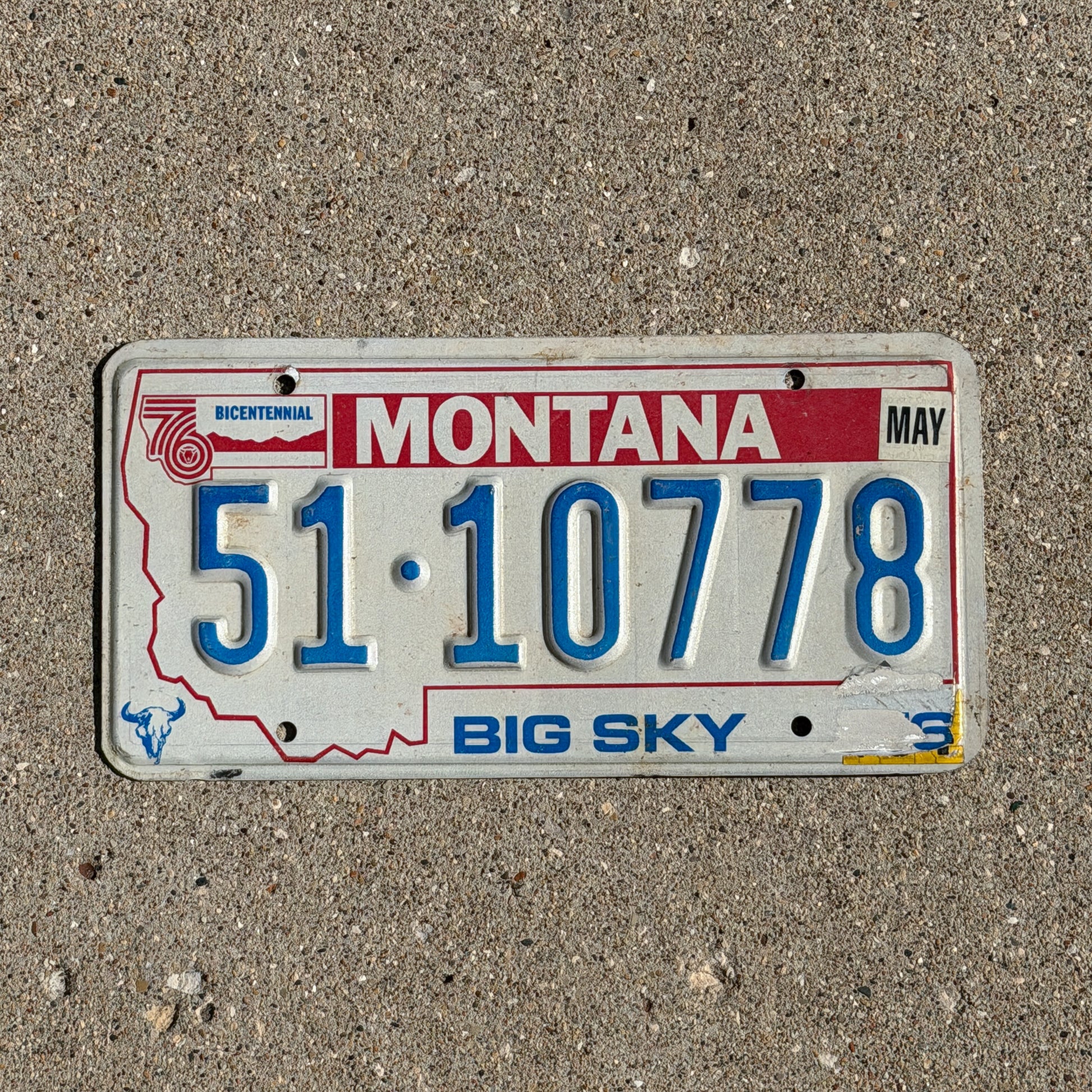 Photo of a 1976 Montana License Plate Auto Tag Garage Decor Vintage Bicentennial 51 10778 with original patina