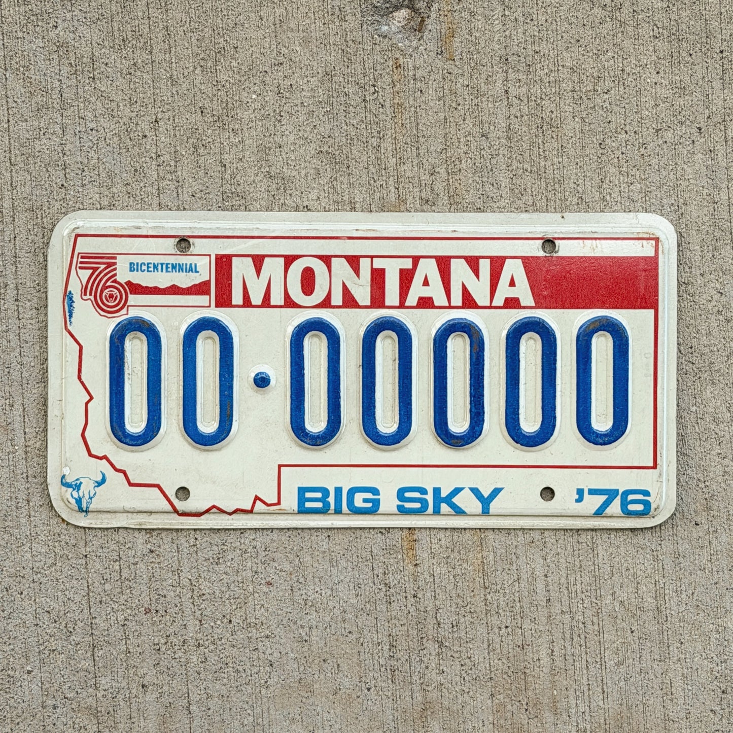 Photo of a 1976 Montana Sample License Plate Auto Tag Garage Decor Vintage Bicentennial 00 00000 with original patina