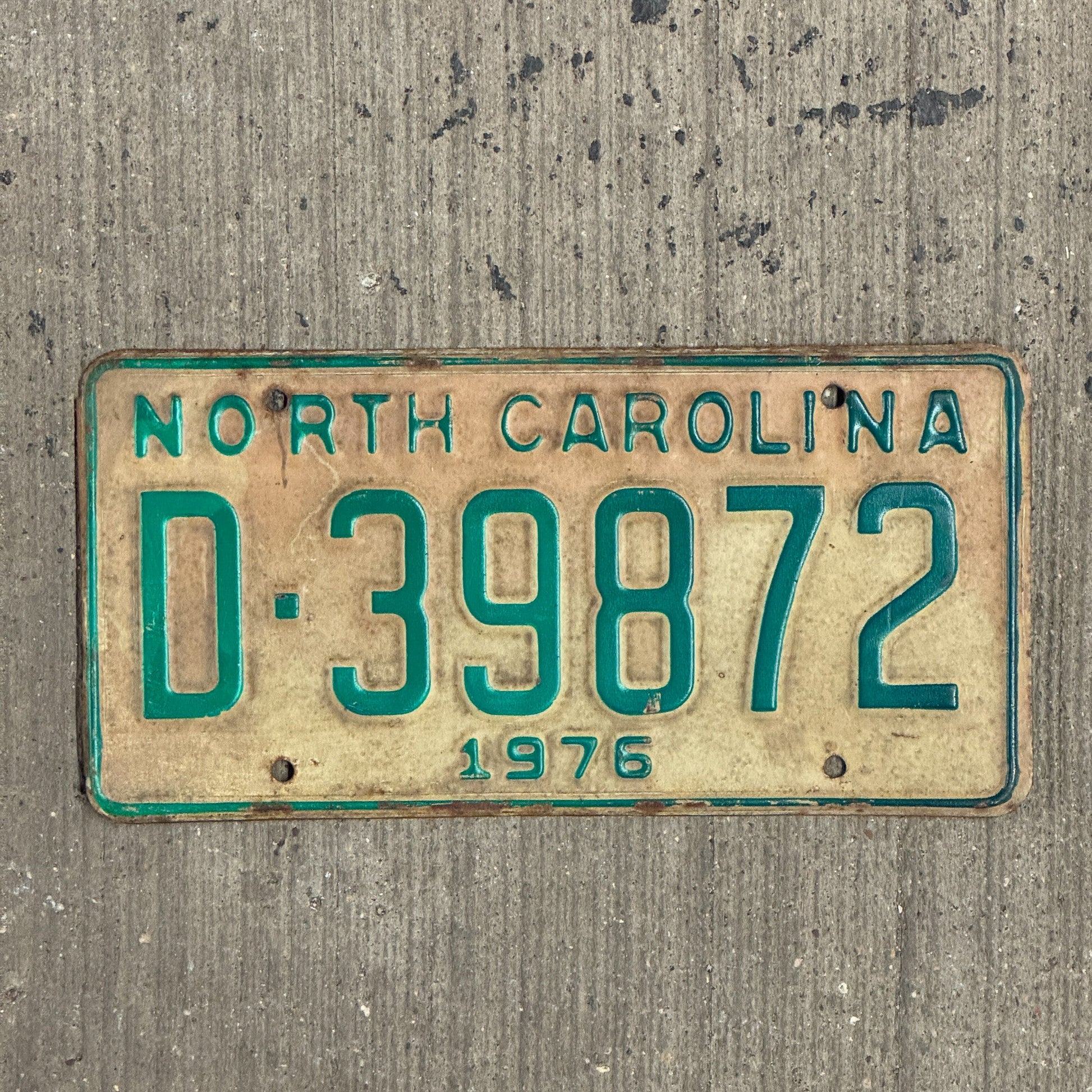 Photo of a 1976 North Carolina Trailer License Plate Auto Tag Garage Decor Vintage D 39872 with original patina