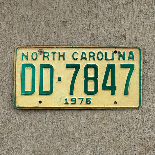 Photo of a 1976 North Carolina Truck License Plate Auto Tag Garage Decor Vintage DD 7847 with original patina