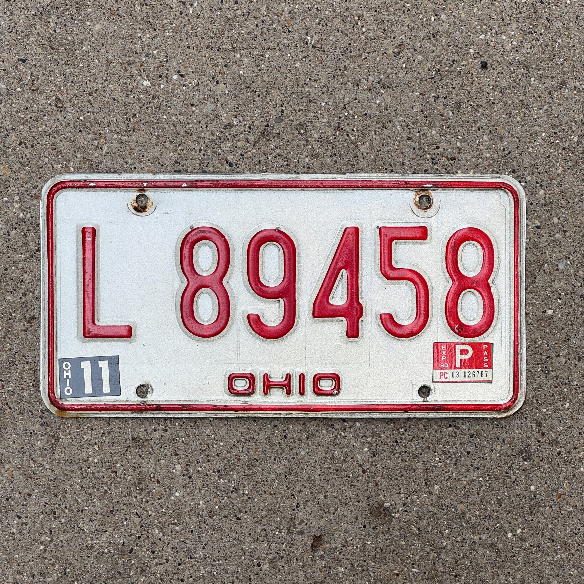 Photo of a 1976 Ohio License Plate Auto Tag 1 Vintage Garage L 89458 with original patina