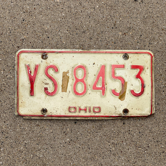 Photo of a 1976 Ohio License Plate Auto Tag 1 Vintage Garage YS 8453 with original patina