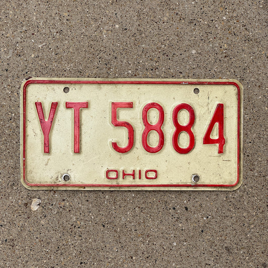 Photo of a 1976 Ohio License Plate Auto Tag 2 Vintage Garage YT 5884 with original patina