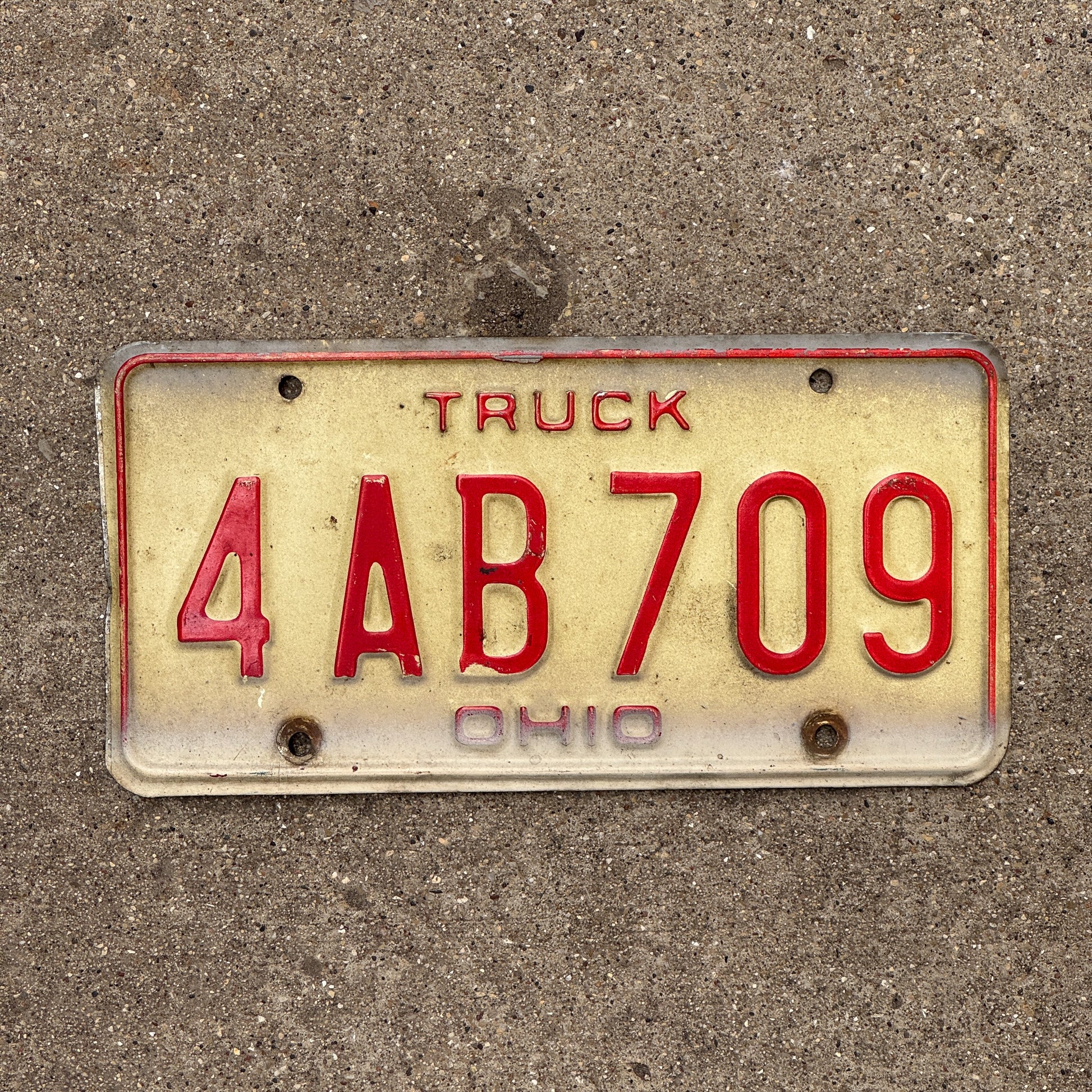 Photo of a 1976 Ohio Truck License Plate Auto Tag 2 Vintage Garage 4 AB 709 with original patina