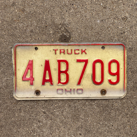 Photo of a 1976 Ohio Truck License Plate Auto Tag 2 Vintage Garage 4 AB 709 with original patina