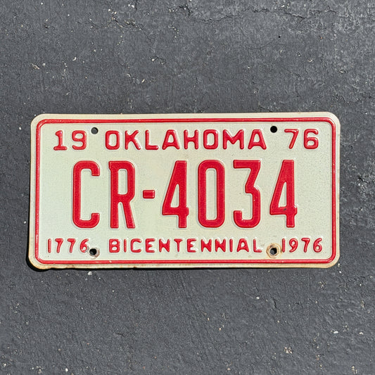 Photo of a 1976 Oklahoma License Plate Auto Tag Garage Decor Vintage Bicentennial CR 4034 with original patina