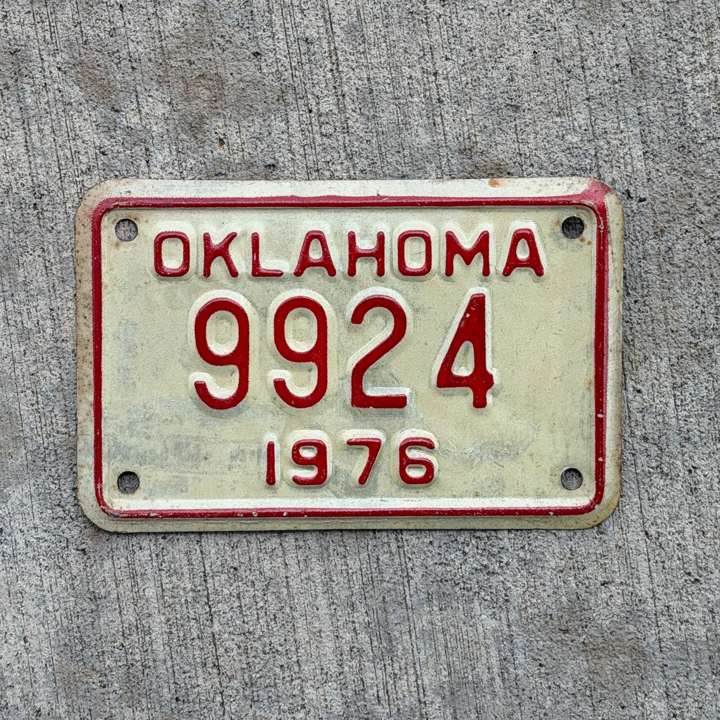 Photo of a 1976 Oklahoma Motorcycle License Plate Auto Tag Garage Decor Vintage 9924 with original patina