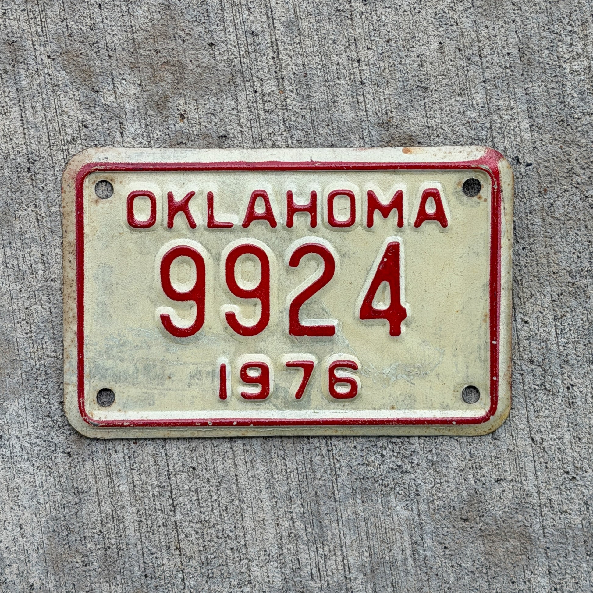 Photo of a 1976 Oklahoma Motorcycle License Plate Auto Tag Garage Decor Vintage 9924 with original patina