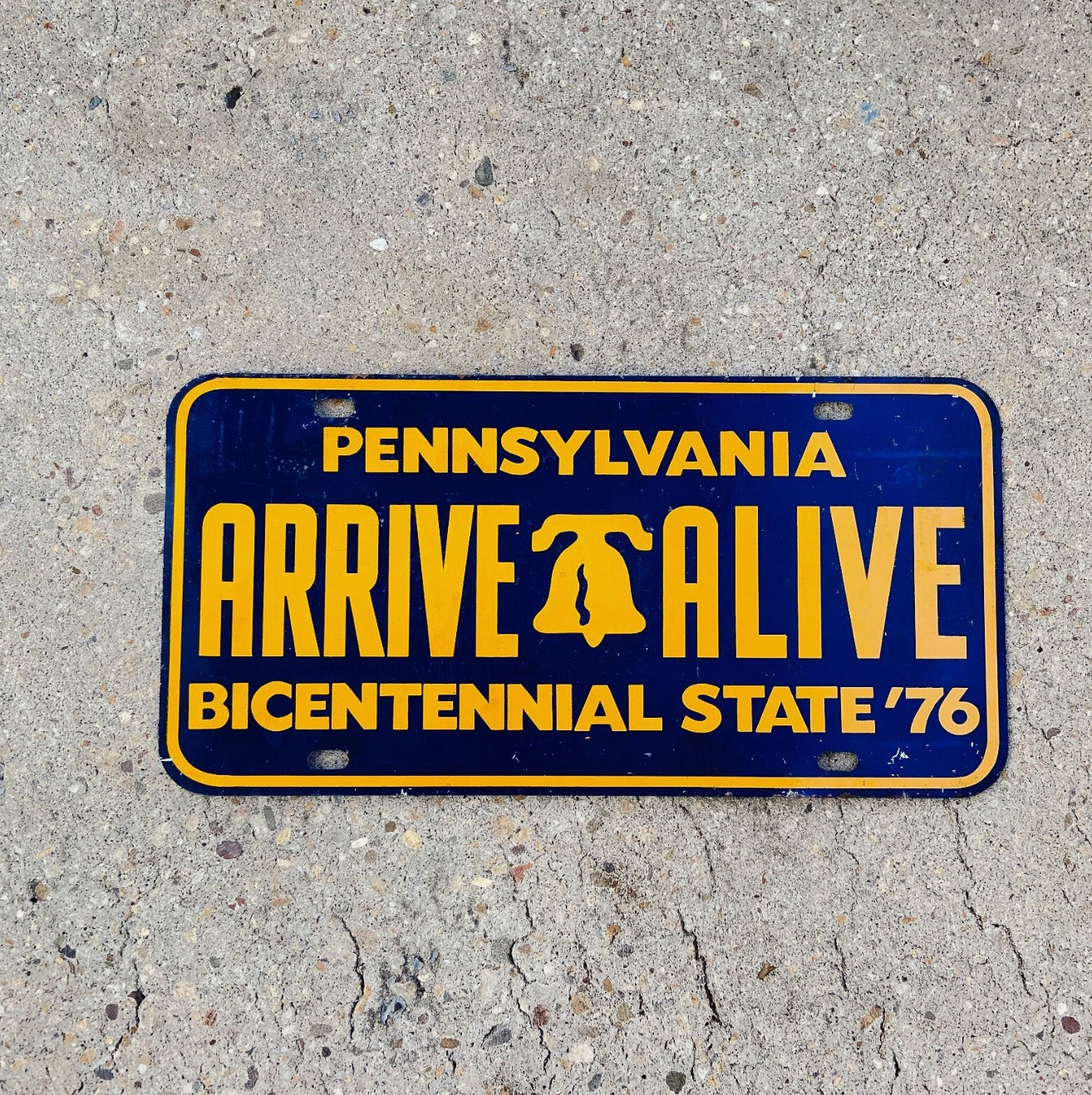 Photo of a 1976 Pennsylvania Booster License Plate Auto Tag Garage Decor Vintage Metal Bicentennial with original patina