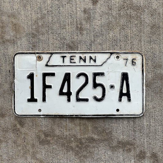 Photo of a 1976 Tennessee Joint Truck License Plate Auto Tag Garage Decor Vintage 1F 425 A with original patina