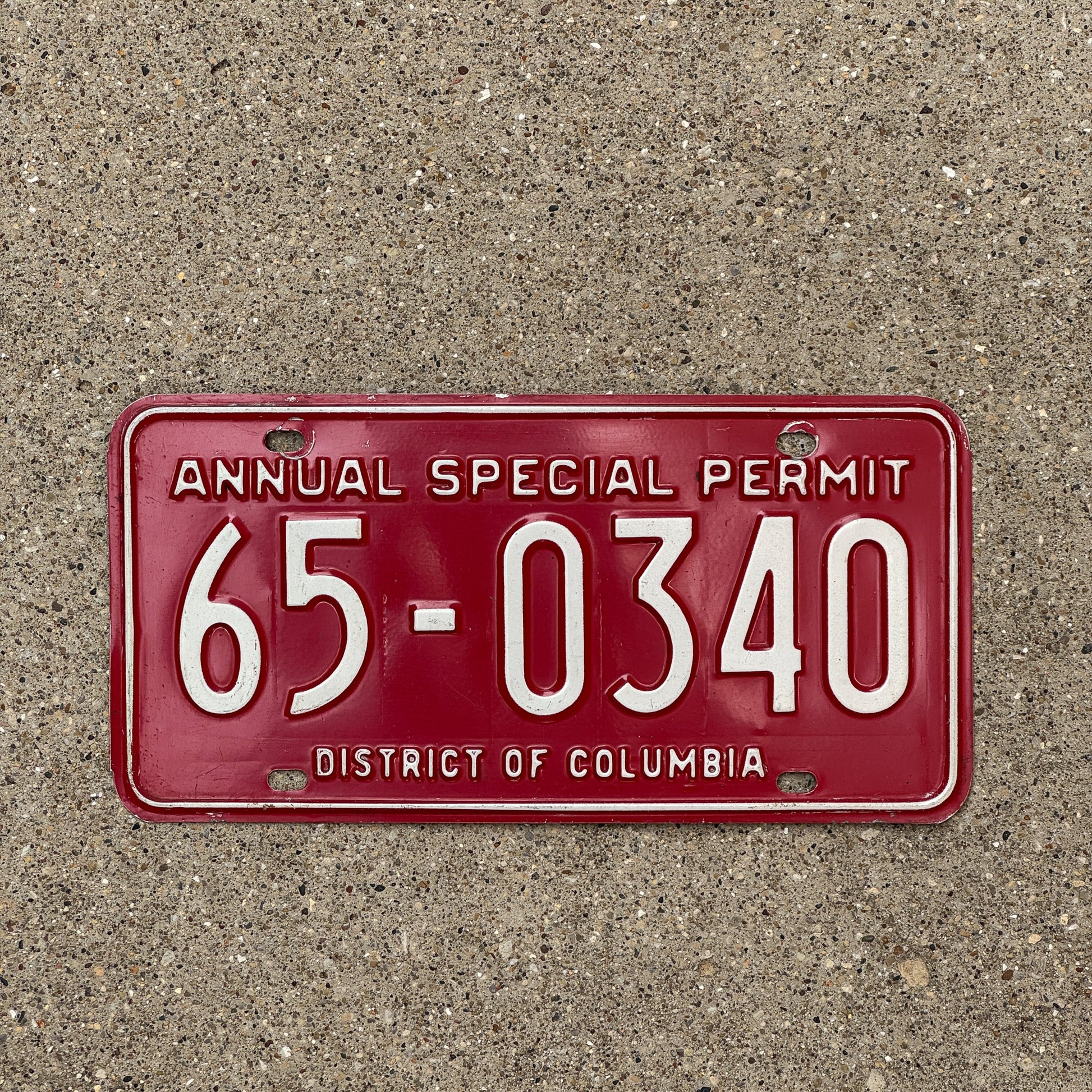 Photo of a 1976 Washington DC Special Permit License Plate Auto Tag Garage 2nd Issue 65 0340 with original patina