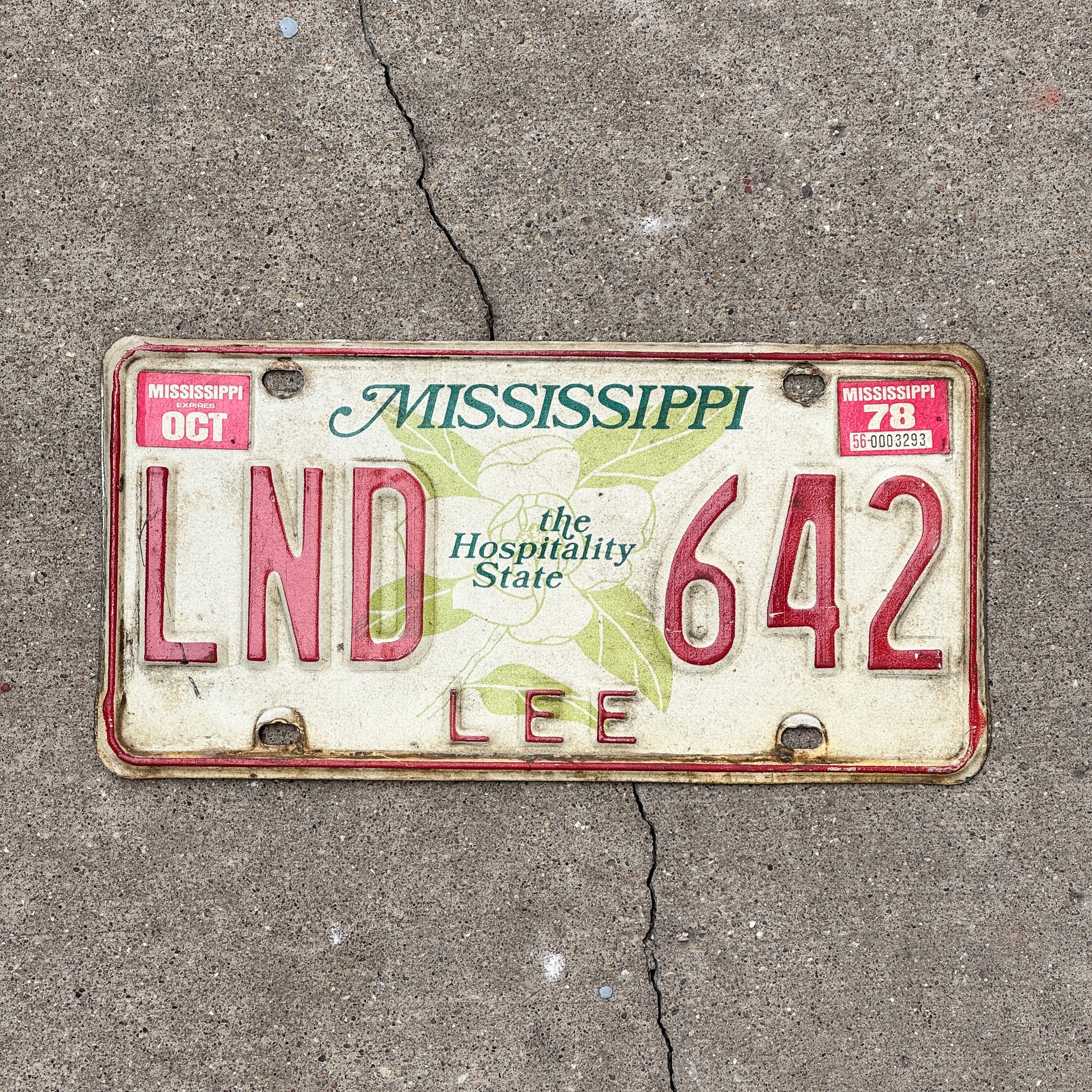 Photo of a 1977 1978 Mississippi License Plate Auto Tag Garage Decor Vintage LND 642 with original patina