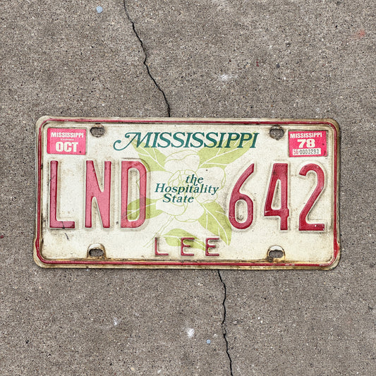 Photo of a 1977 1978 Mississippi License Plate Auto Tag Garage Decor Vintage LND 642 with original patina