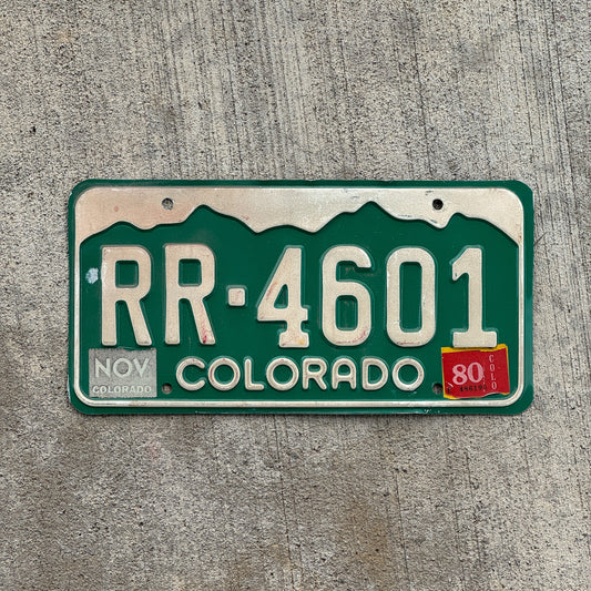 Photo of a 1977 1980 Colorado License Plate Auto Tag Garage Decor Vintage RR 4601 with original patina