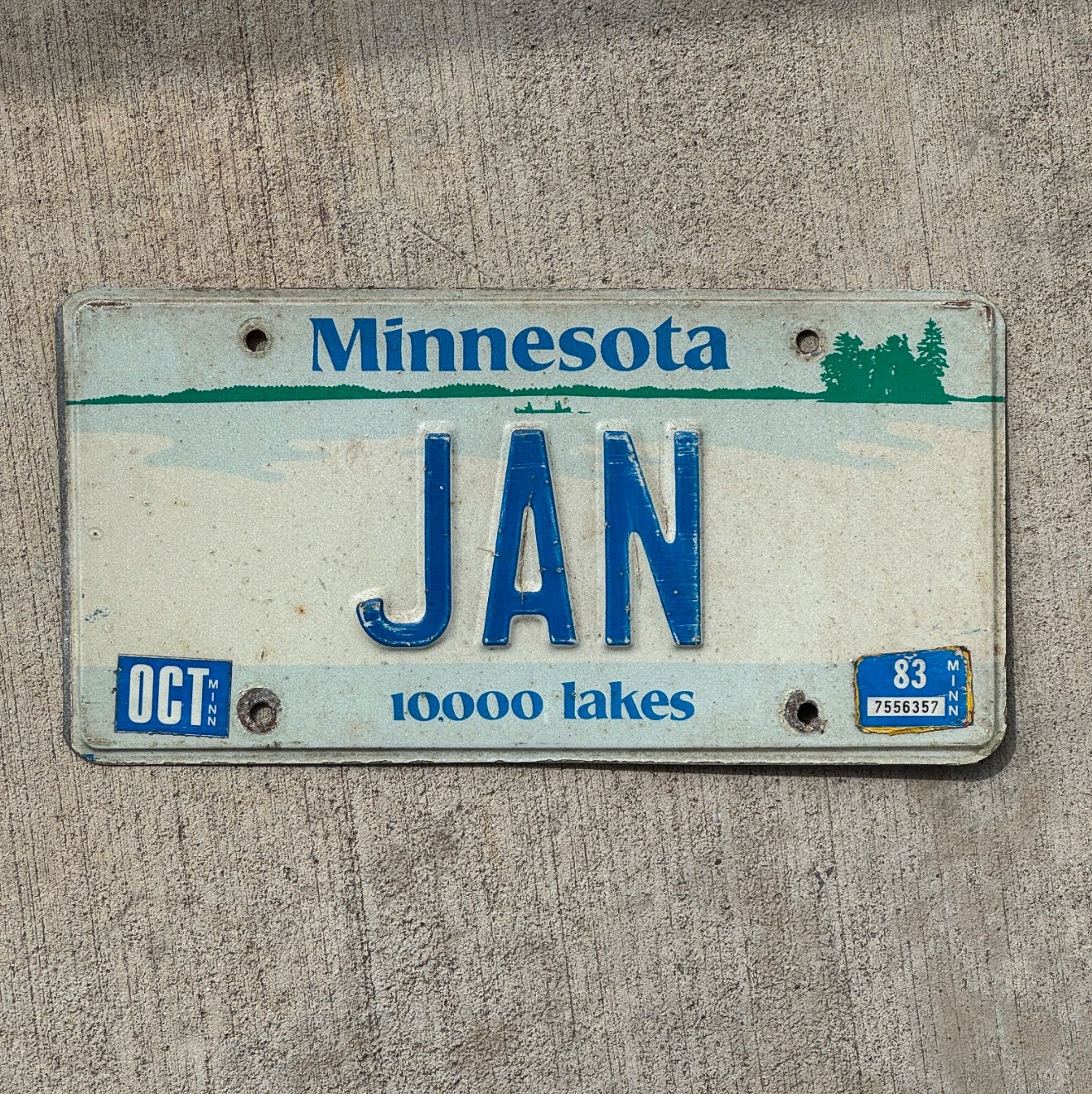 Photo of a 1977 1983 Minnesota Vanity License Plate Auto Tag Garage Decor Vintage Birthday Month Name JAN with original patina