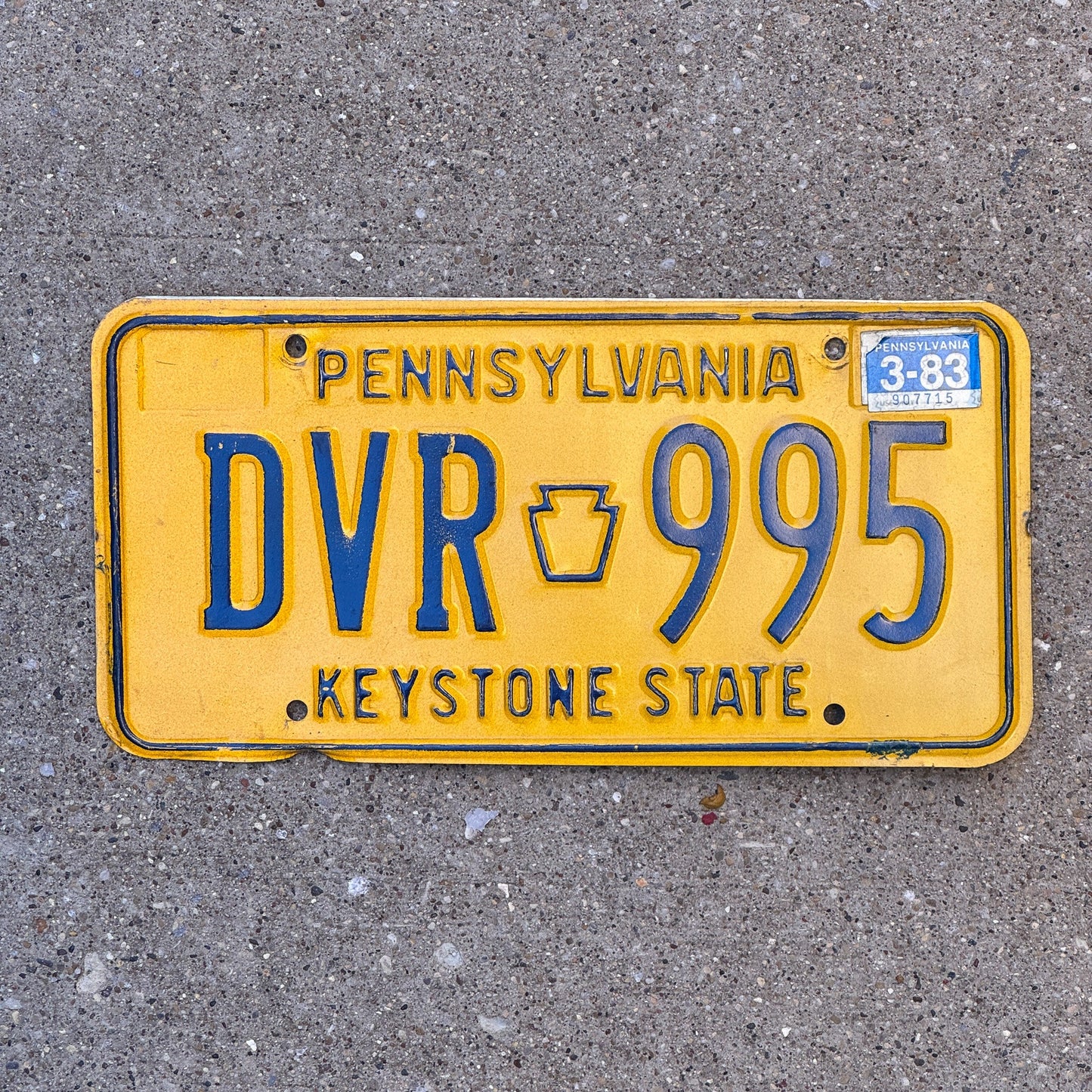 Photo of a 1977 1983 Pennsylvania License Plate Auto Tag Garage Decor Vintage DVR 995 with original patina