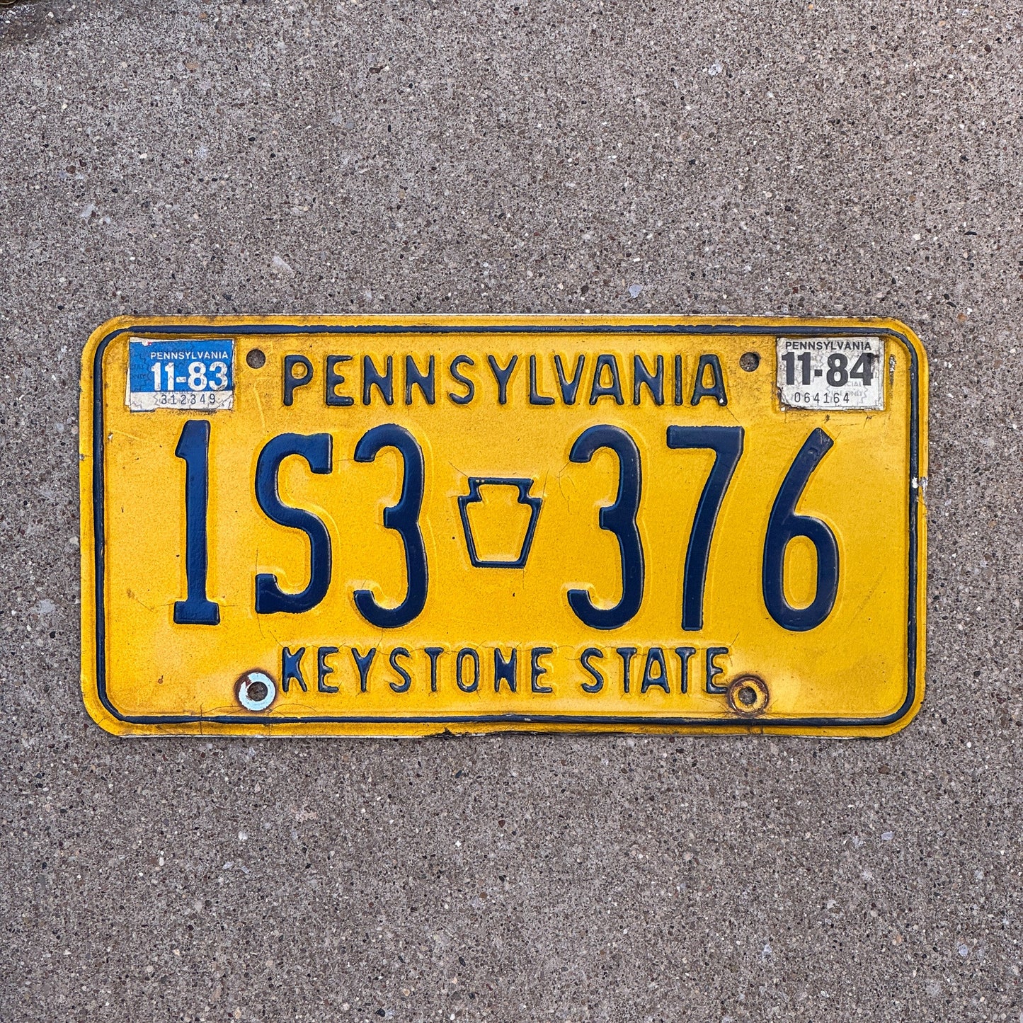 Photo of a 1977 1984 Pennsylvania License Plate Auto Tag Garage Decor Vintage 1S3 376 with original patina