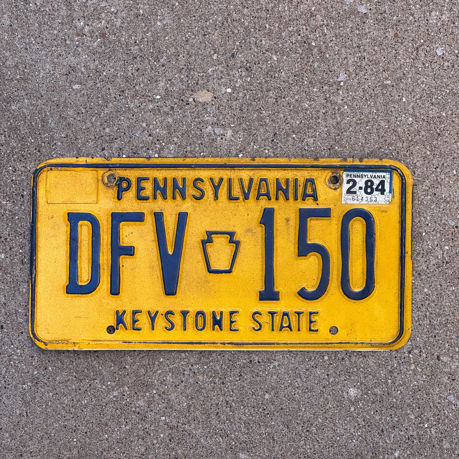 Photo of a 1977 1984 Pennsylvania License Plate Auto Tag Garage Decor Vintage DFV 150 with original patina