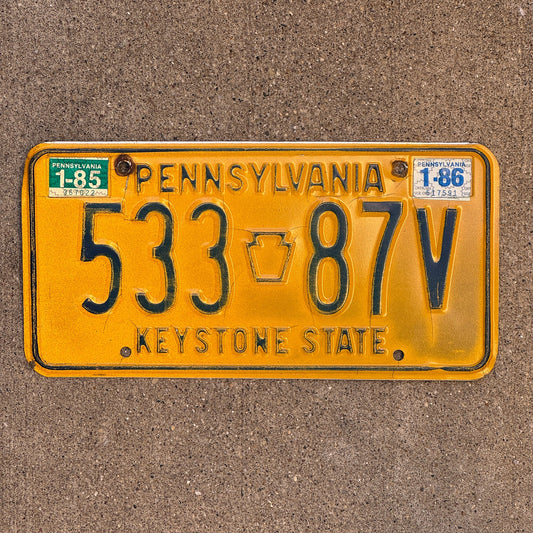 Photo of a 1977 1986 Pennsylvania License Plate Auto Tag Garage Decor Vintage 533 87 V with original patina