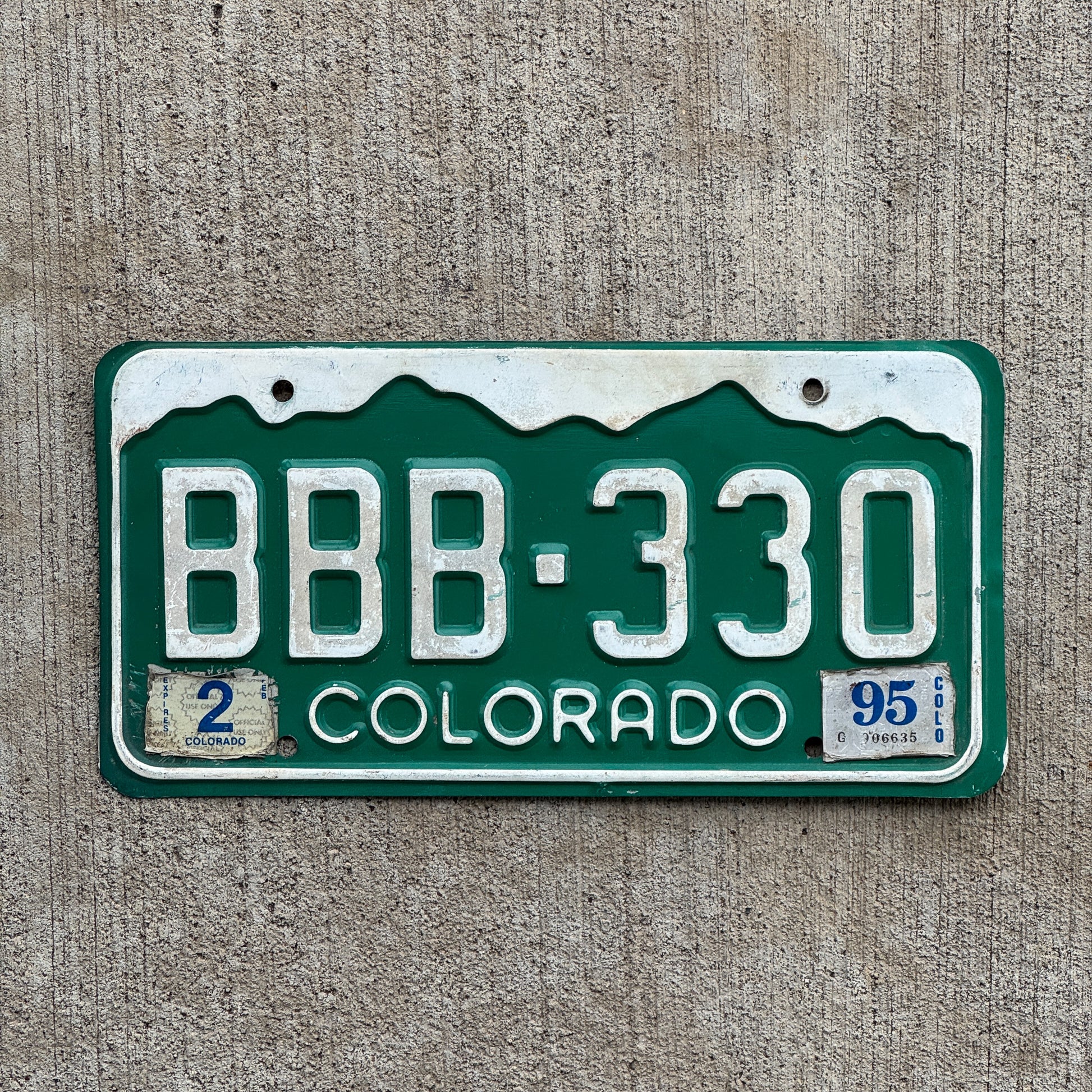 Photo of a 1977 1995 Colorado License Plate Auto Tag Garage Decor Vintage Repeat Repeating BBB 330 with original patina