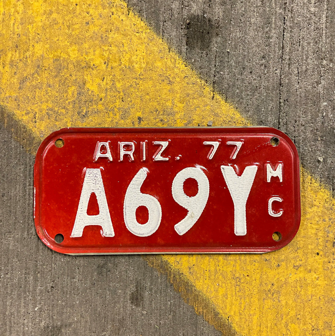 Photo of a 1977 Arizona Motorcycle License Plate Auto Tag Garage Decor Vintage A69Y with original patina