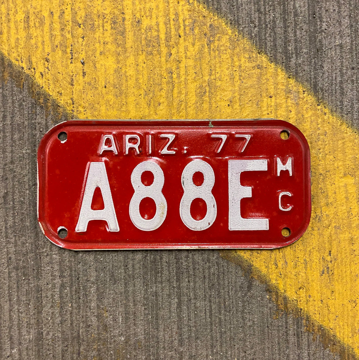 Photo of a 1977 Arizona Motorcycle License Plate Auto Tag Garage Decor Vintage A88E with original patina