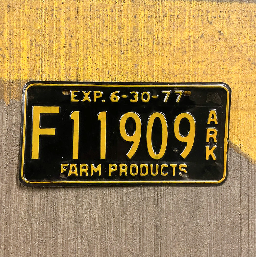 Photo of a 1977 Arkansas Farm Products License Plate Auto Tag Garage Decor Vintage F 11909 with original patina