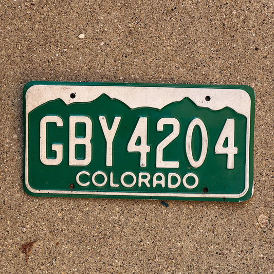 Photo of a 1977 Colorado License Plate Auto Tag Garage Decor Vintage 420 Weed Smoke GBY 4204
