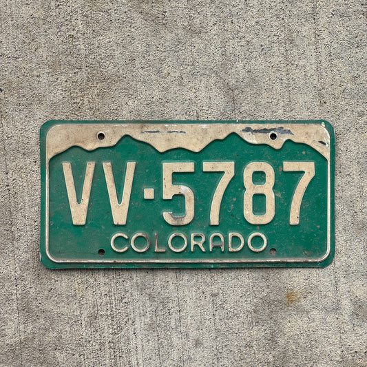 Photo of a 1977 Colorado License Plate Auto Tag Garage Decor Vintage VV 5787 with original patina