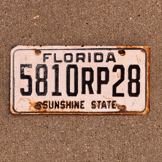 Photo of a 1977 Florida Real Property License Plate Auto Tag Garage Decor Vintage Mobile Home 5810 RP 28