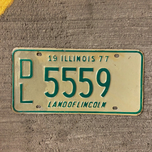 Photo of a 1977 Illinois Dealer License Plate Auto Tag Garage Decor Vintage Repeat Repeating 5559 with original patina