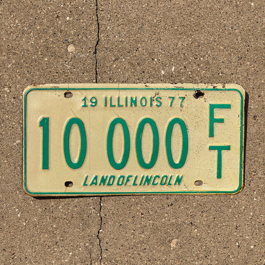 Photo of a 1977 Illinois Fertilizer Trailer License Plate Auto Tag Garage Decor Vintage 10000 FT