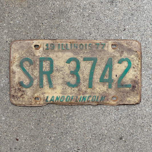 Photo of a 1977 Illinois License Plate Auto Tag 1 Vintage Garage SR 3742 with original patina