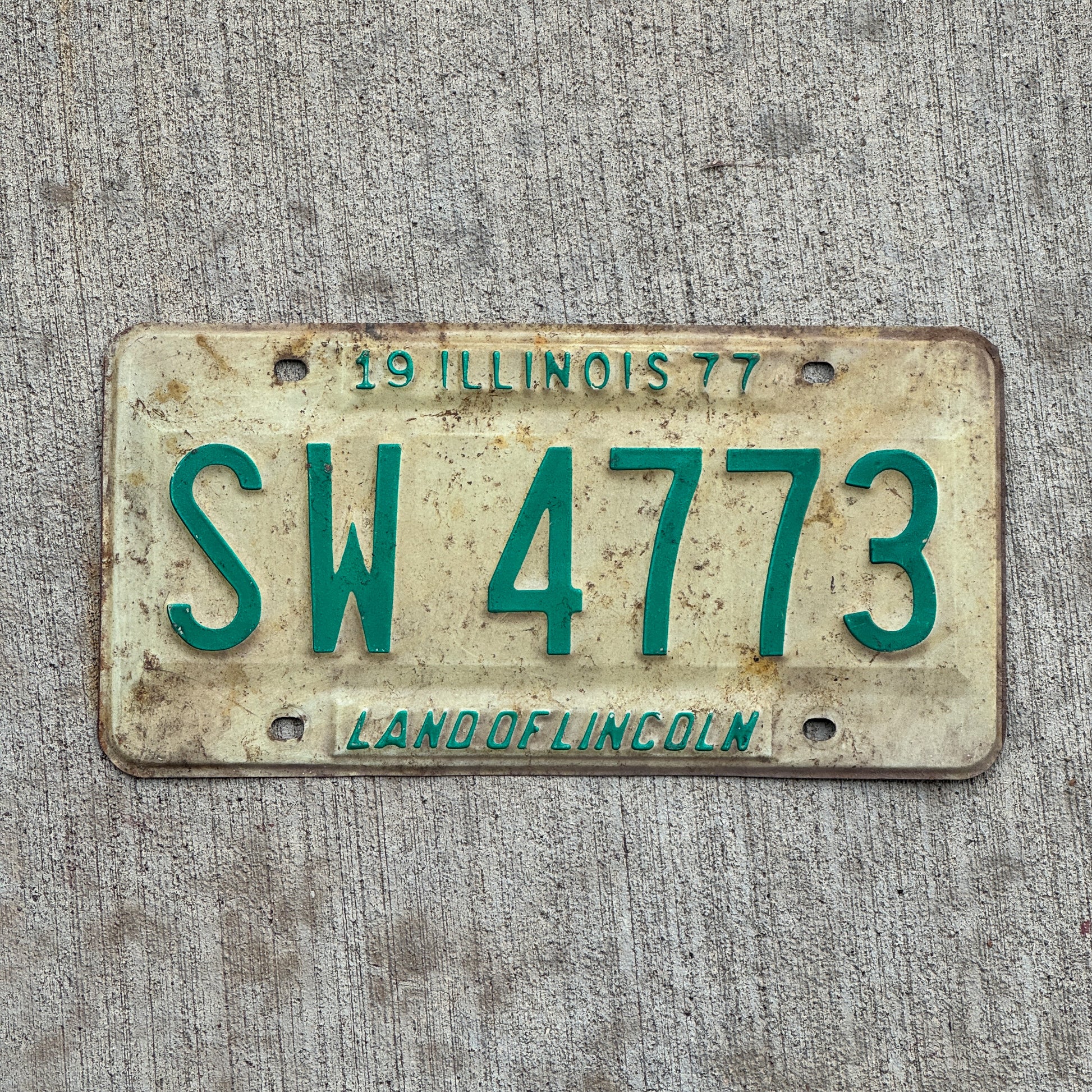 Photo of a 1977 Illinois License Plate Auto Tag 1 Vintage Garage SW 4773 with original patina