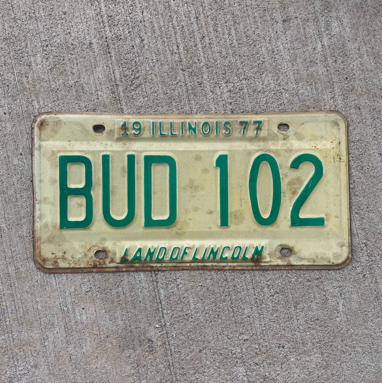 Photo of a 1977 Illinois License Plate Auto Tag 2 Vintage Garage 420 Weed Pot Smoke BUD 102 with original patina