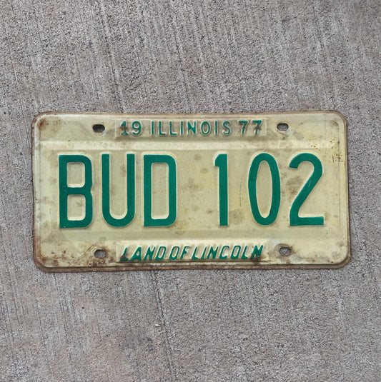 Photo of a 1977 Illinois License Plate Auto Tag 2 Vintage Garage 420 Weed Pot Smoke BUD 102 with original patina