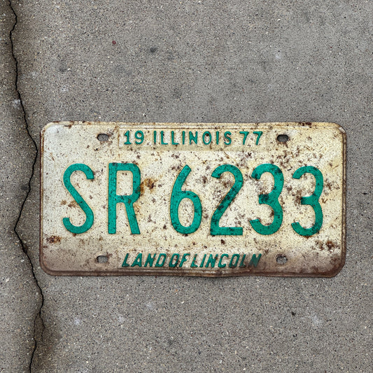 Photo of a 1977 Illinois License Plate Auto Tag 2 Vintage Garage SR 6233 with original patina