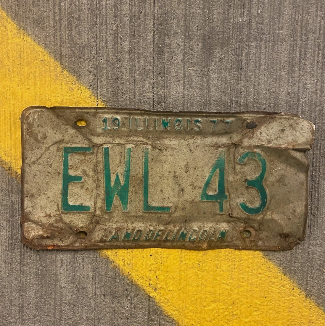 Photo of a 1977 Illinois License Plate Auto Tag Garage Decor Vintage EWL 43