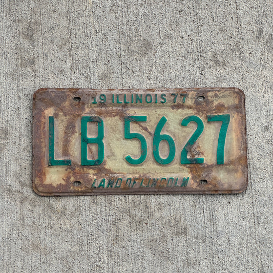 Photo of a 1977 Illinois License Plate Auto Tag Garage Decor Vintage LB 5627 with original patina