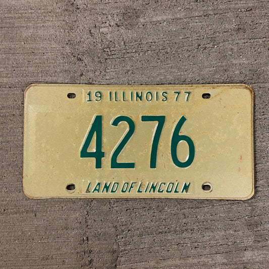 Photo of a 1977 Illinois License Plate Auto Tag Garage Decor Vintage Low Number Four Digit 4276 with original patina