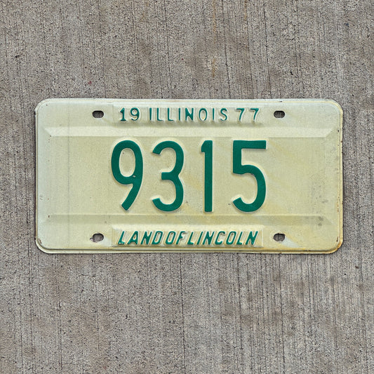 Photo of a 1977 Illinois License Plate Auto Tag Garage Decor Vintage Low Number Four Digit 9315 with original patina