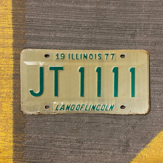 Photo of a 1977 Illinois License Plate Auto Tag Garage Decor Vintage Repeat Repeating JT 1111 with original patina