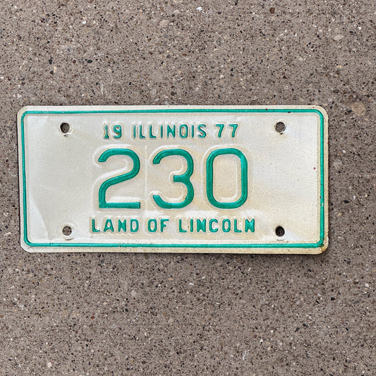 Photo of a 1977 Illinois Motorcycle License Plate Auto Tag Garage Decor Vintage Low Number Three Digit 230 with original patina