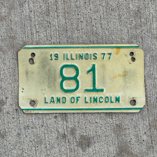 Photo of a 1977 Illinois Motorcycle License Plate Auto Tag Garage Decor Vintage Low Number Two Digit 81 with original patina