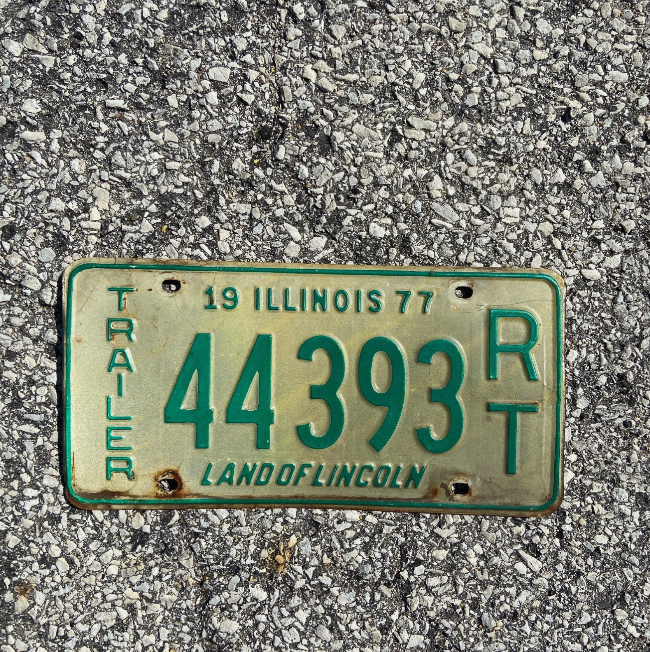 Photo of a 1977 Illinois Trailer License Plate Auto Tag Garage Decor Vintage 44393 RT