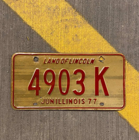 Photo of a 1977 Illinois Truck License Plate Auto Tag Garage Decor Vintage 4903 K with original patina