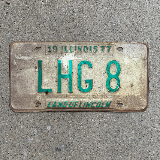 Photo of a 1977 Illinois Vanity License Plate Auto Tag 1 Vintage Garage LHG 8 with original patina