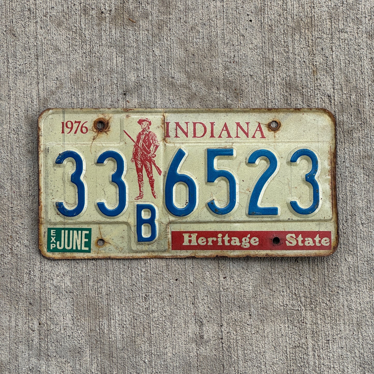 Photo of a 1977 Indiana License Plate Auto Tag Garage Decor Vintage 33 B 6523 with original patina