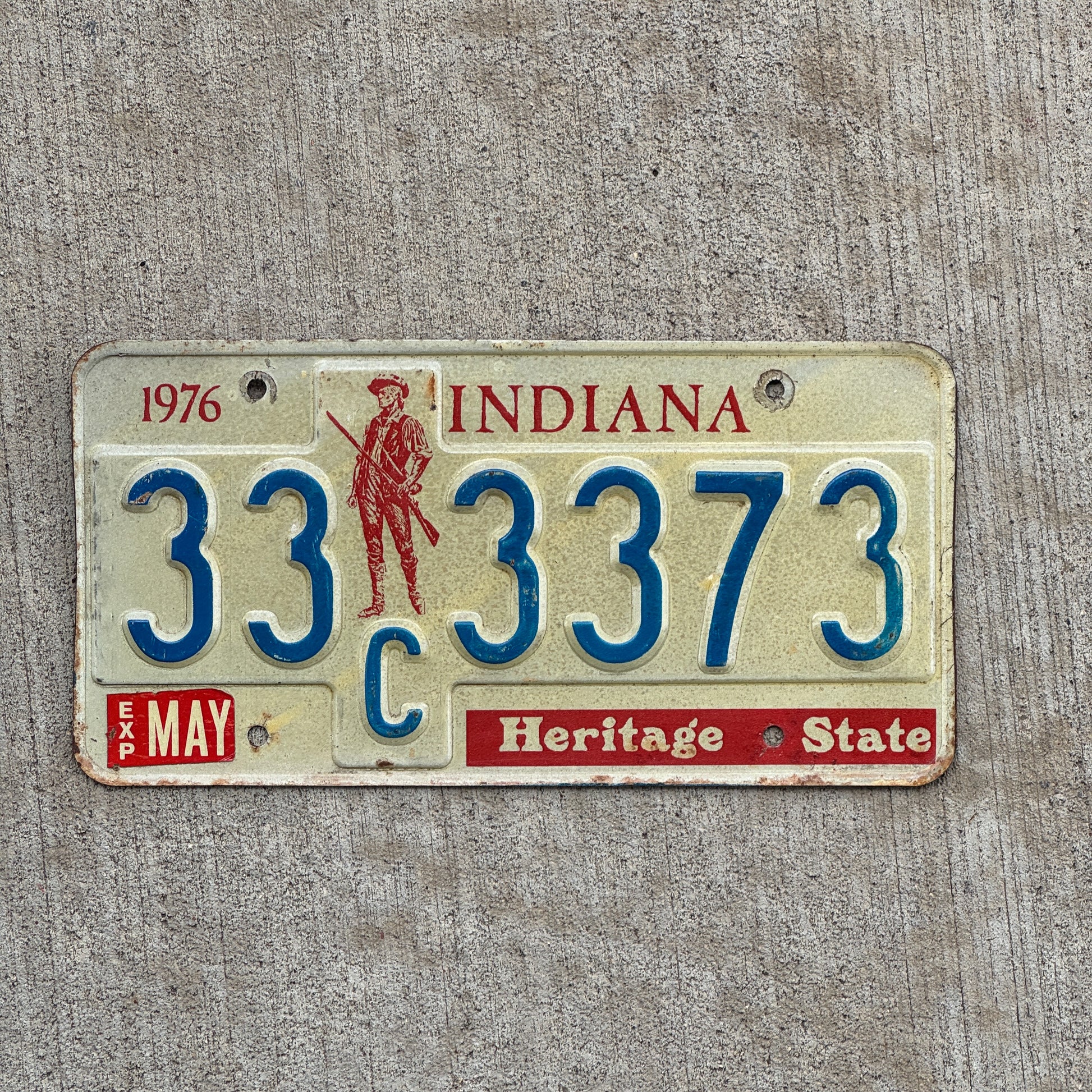 Photo of a 1977 Indiana License Plate Auto Tag Garage Decor Vintage 33 C 3373 with original patina