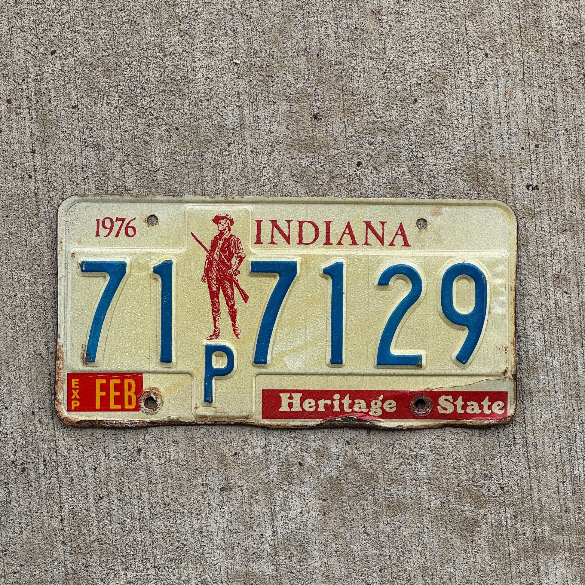 Photo of a 1977 Indiana License Plate Auto Tag Garage Decor Vintage 71 P 7129 with original patina
